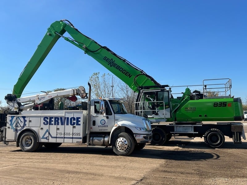Sennebogen excavator and service truck